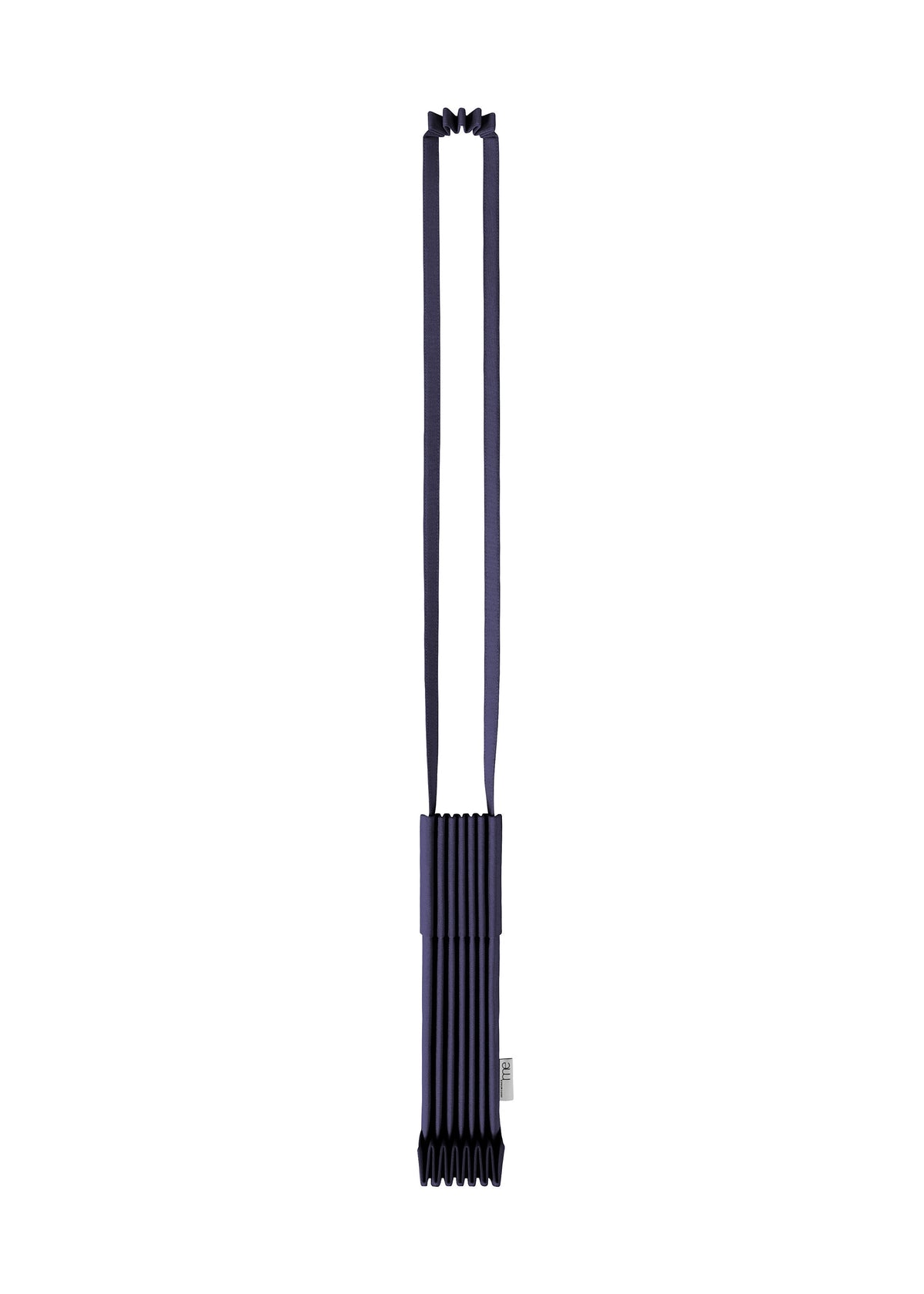 A long, dark blue pleated fabric strap with a rectangular, accordion-folded section at the bottom and a small white tag on the side. The overall design of the me ISSEY MIYAKE TRUNK PLEATS BAG 12 is minimal and modern, highlighted by its vivid color that adds a refined touch to any shoulder bag collection. view 6 of 16
