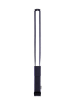 A long, dark blue pleated fabric strap with a rectangular, accordion-folded section at the bottom and a small white tag on the side. The overall design of the me ISSEY MIYAKE TRUNK PLEATS BAG 12 is minimal and modern, highlighted by its vivid color that adds a refined touch to any shoulder bag collection. - NAVY （no.75）