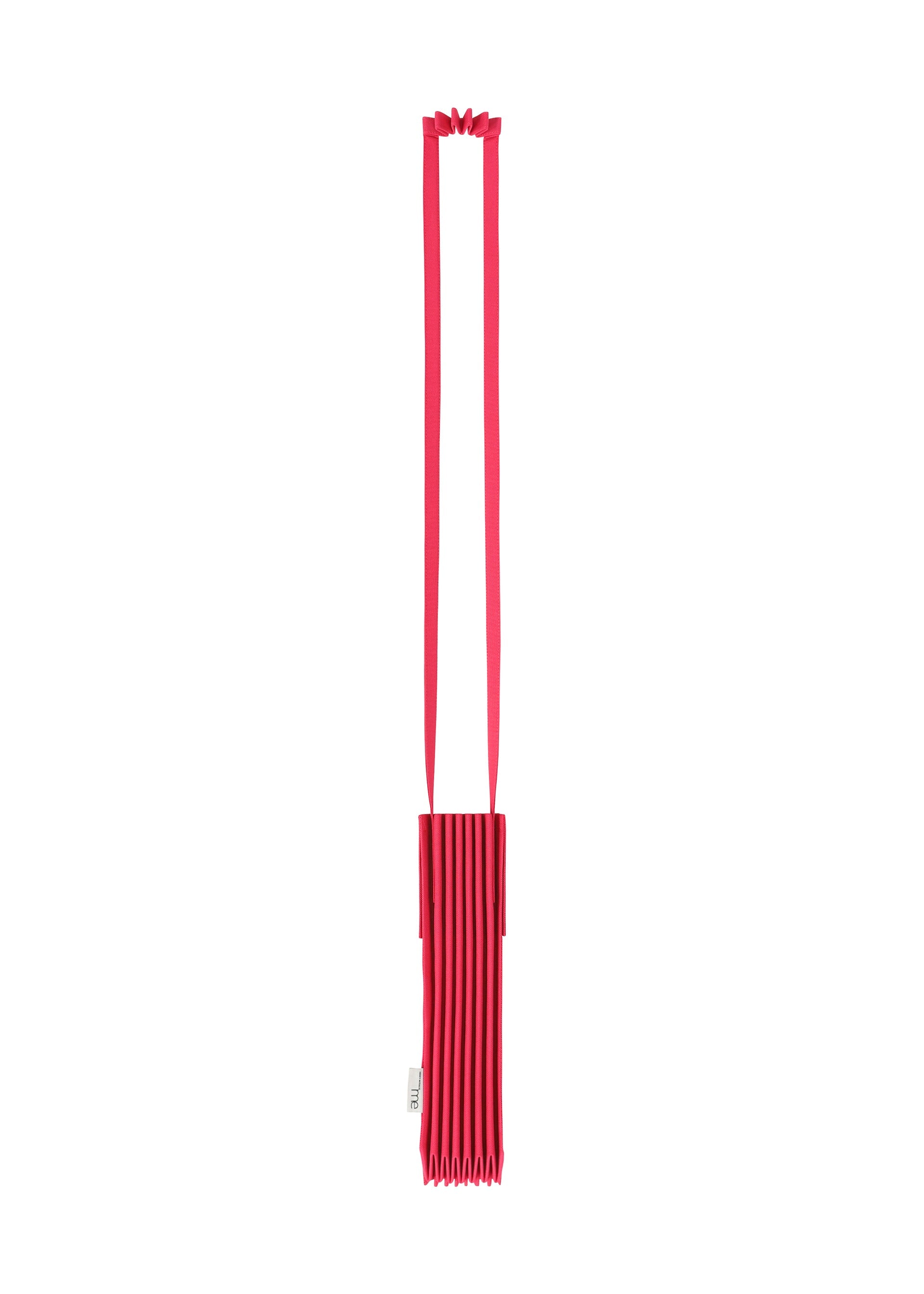 Zoomed view The TRUNK PLEATS BAG 12 by me ISSEY MIYAKE is a red pleated shoulder bag with a long, flat strap and an accordion-style body, displayed against a white background.
