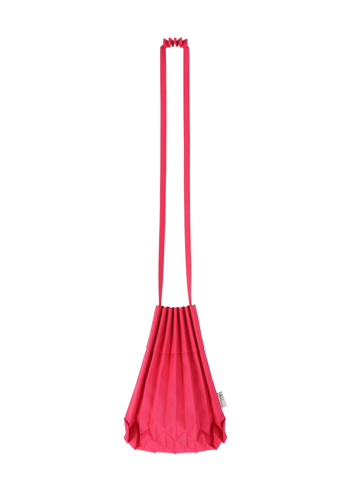 The TRUNK PLEATS BAG 12 by me ISSEY MIYAKE is crafted from bright pink pleated fabric and comes with a long, matching strap. This bold shoulder bag showcases a unique geometric, fan-like silhouette and features a small side tag. The bag is displayed against a plain white background. view 16 of 16