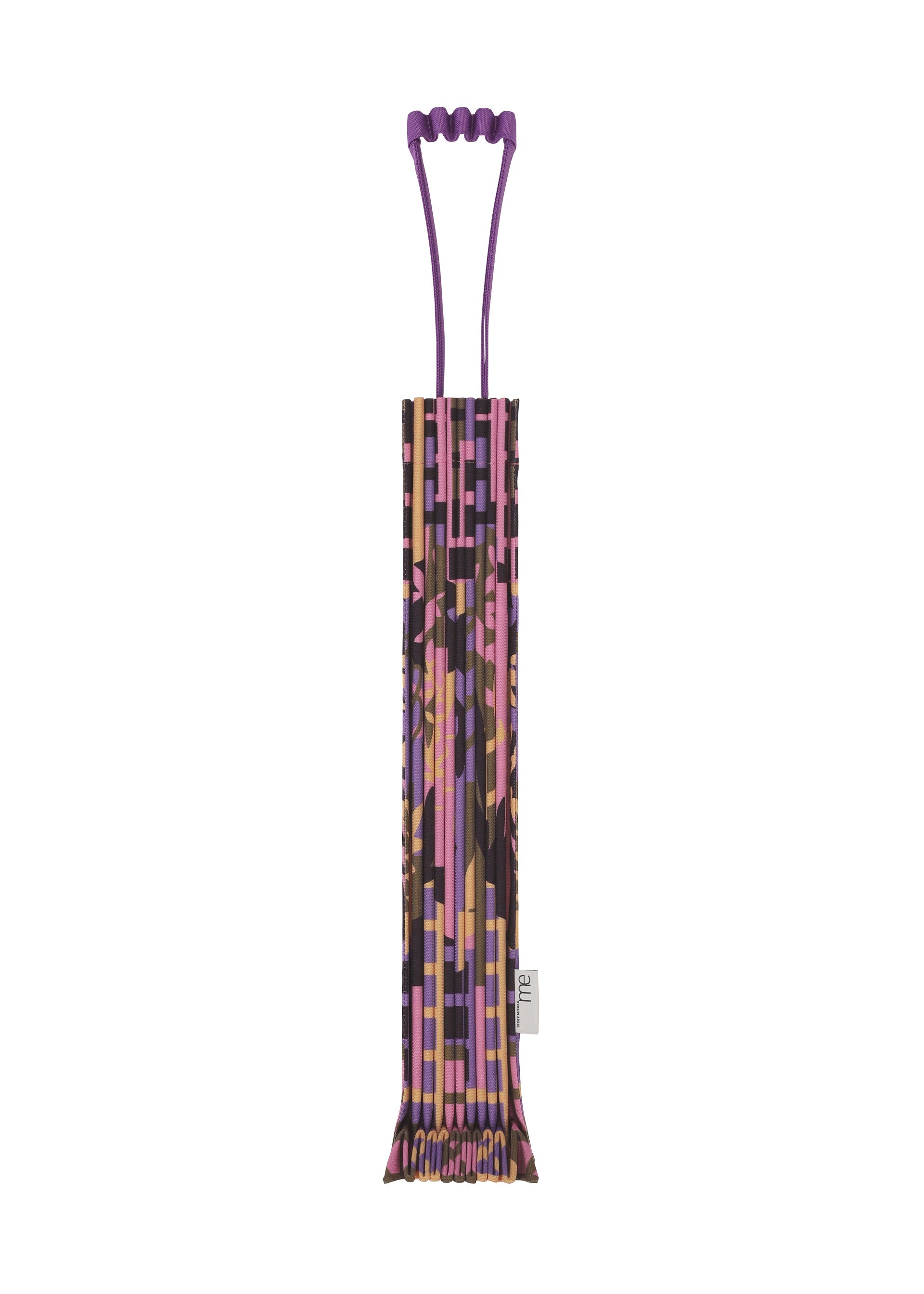 Zoomed view The BUILDING TRUNK PLEATS BAG by me ISSEY MIYAKE—a rectangular tote featuring purple handles and a mix of pink, brown, and gold geometric prints—stands upright against a white background. - PINK-HUED （no.27）
