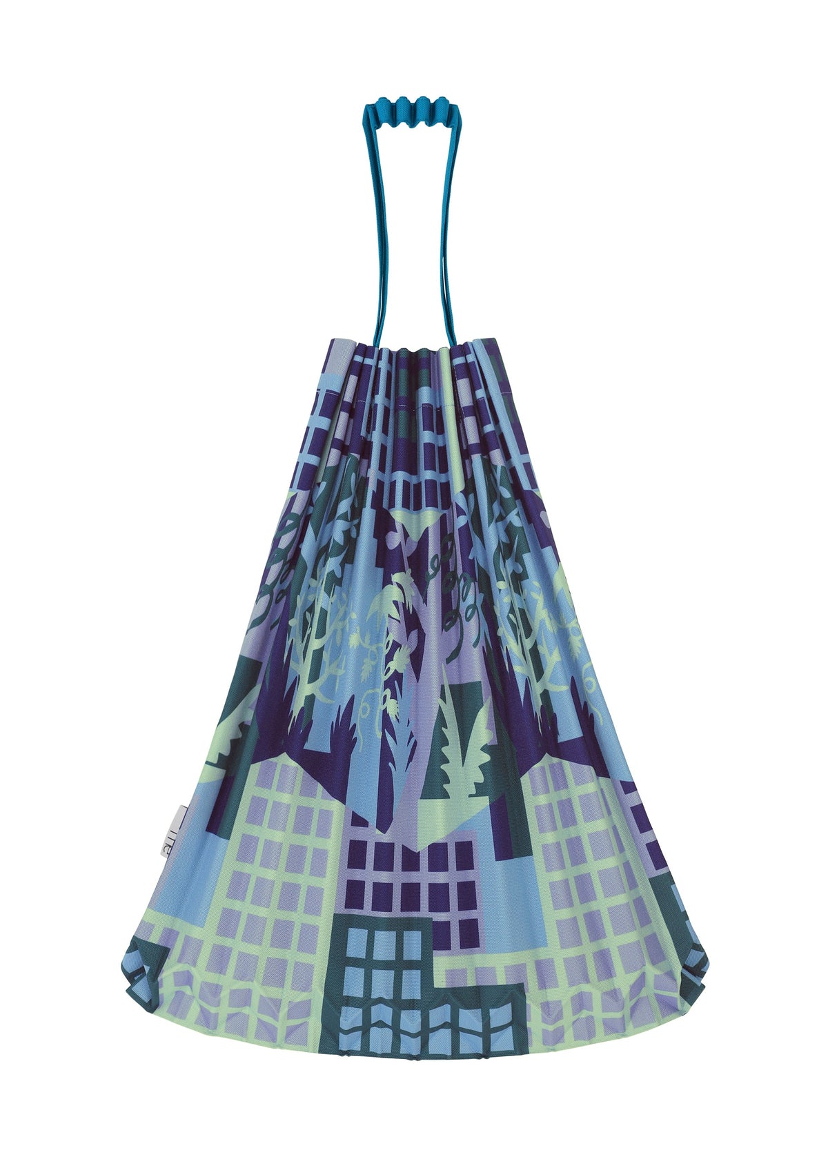 The BUILDING TRUNK PLEATS BAG by me ISSEY MIYAKE is a reusable tote featuring blue handles and an artistic cityscape pattern in shades of blue, purple, and green, with buildings, trees, and subtle urban farming elements. view 4 of 8