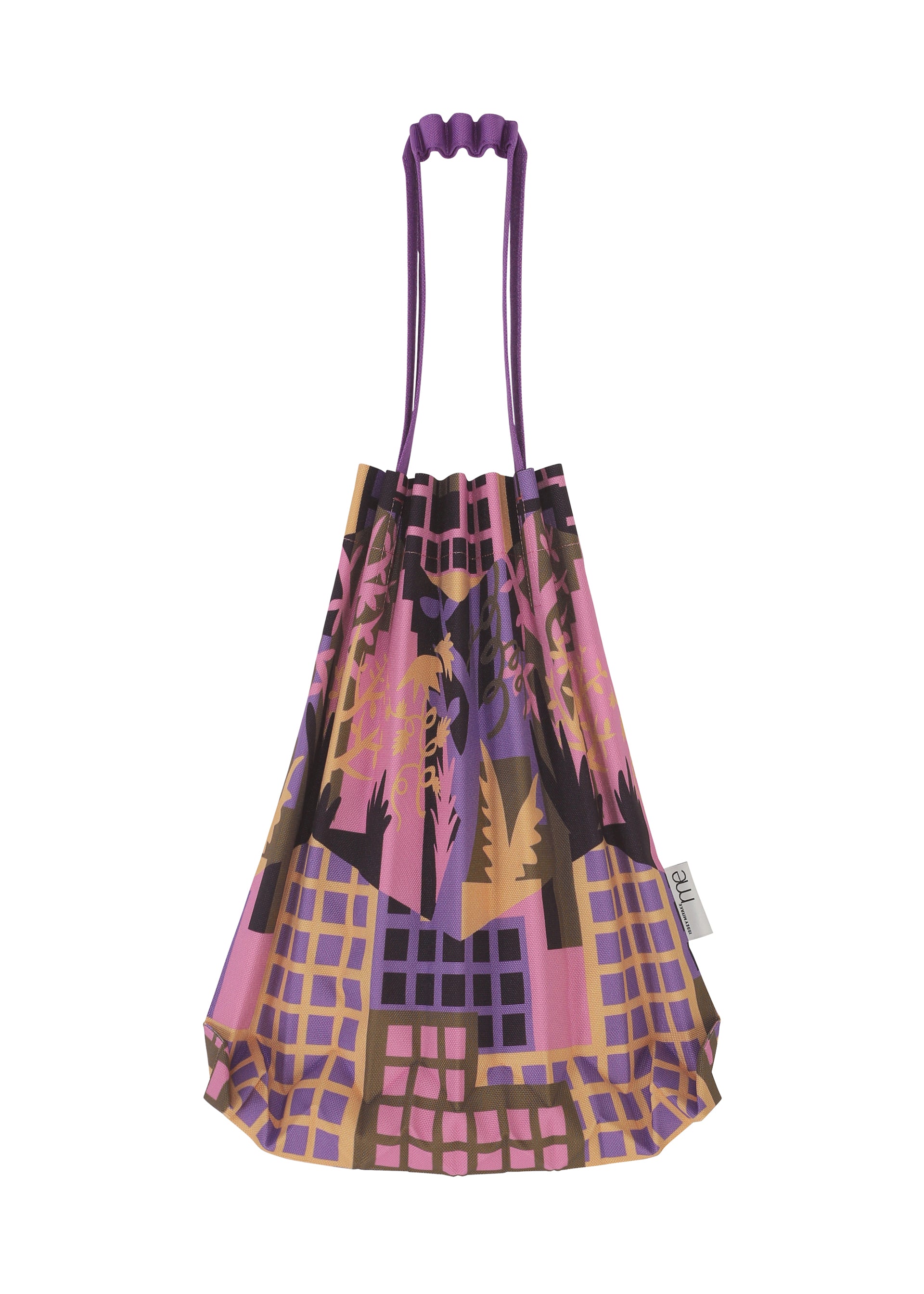Zoomed view The BUILDING TRUNK PLEATS BAG from me ISSEY MIYAKE is a mini tote featuring a purple, pink, and brown pattern with geometric and organic shapes. It has a distinctive ruched handle and a small white tag attached to the side.