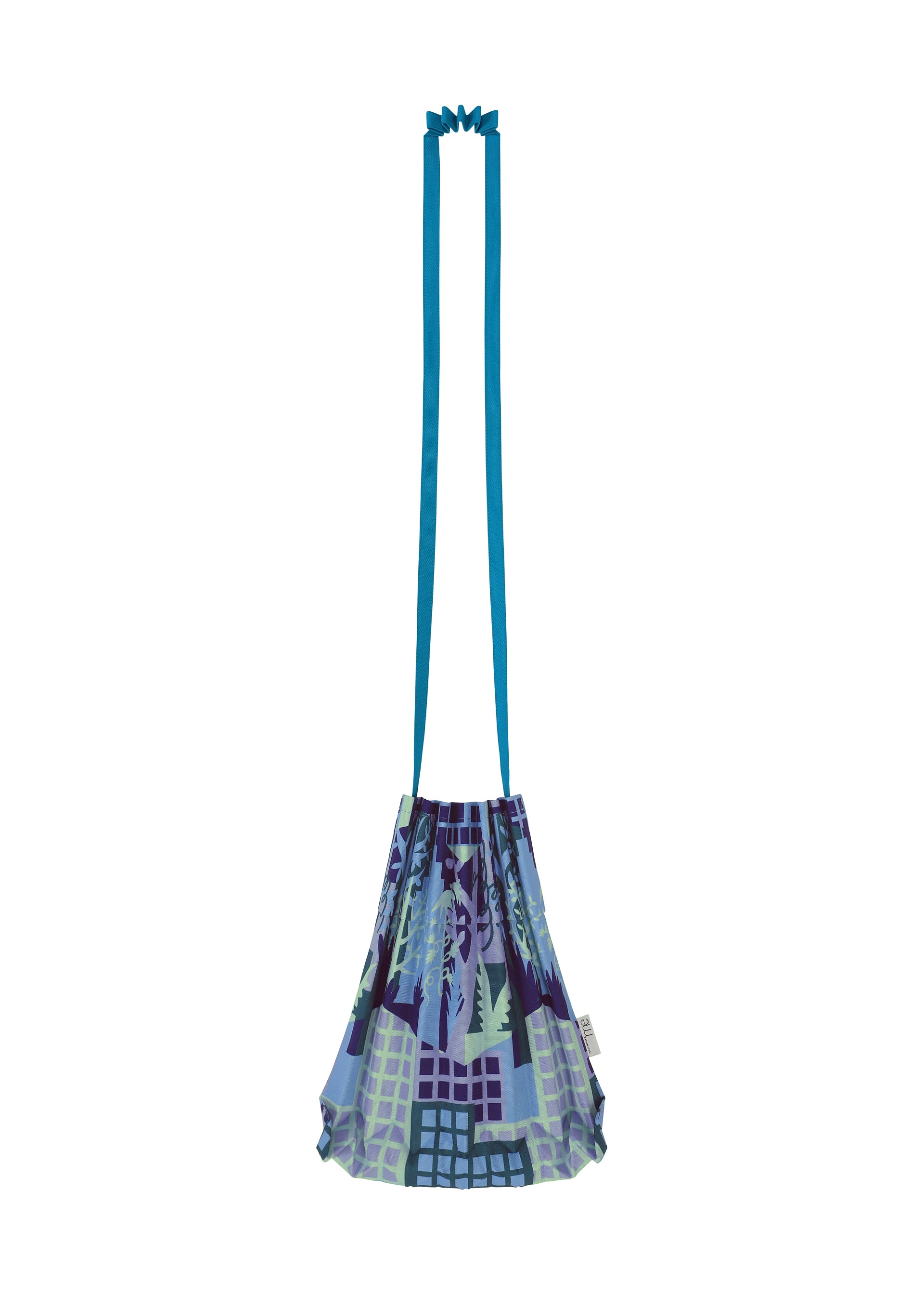 Zoomed view Introducing the BUILDING TRUNK PLEATS BAG by me ISSEY MIYAKE—a compact drawstring shoulder bag featuring striking blue straps and a vibrant geometric pattern in shades of blue, green, and purple set against a crisp white background. Its distinctive handle design blends style with practicality, making it the ideal accessory for carrying your essentials whether you’re navigating city streets or tending to your urban garden.