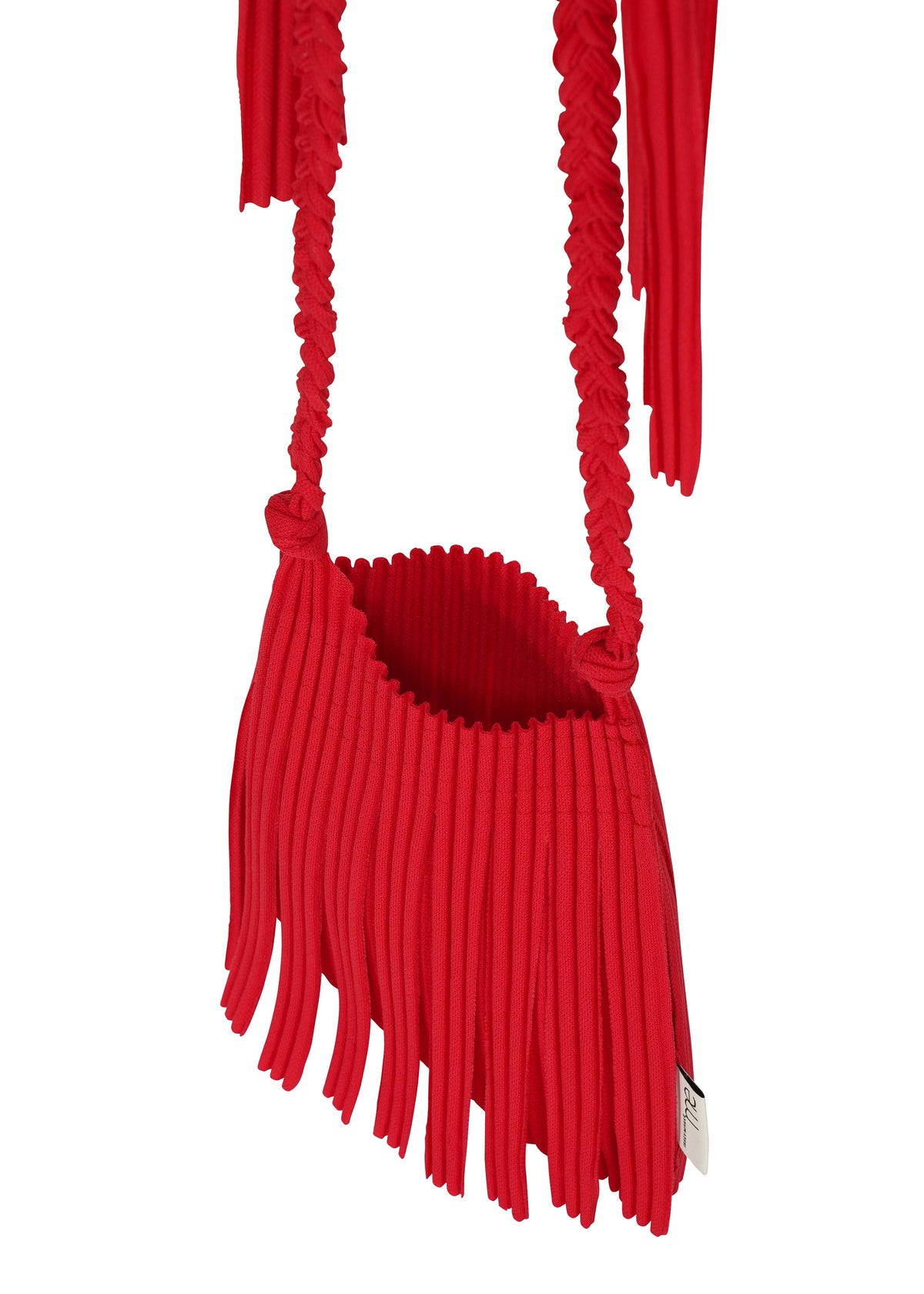 The LEAF PLEATS BAG by me ISSEY MIYAKE is a small, bright red fringed bag featuring a braided strap and a ribbed textured body, displayed against a white background. view 5 of 6