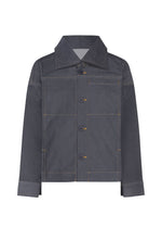 The FLAT DENIM by me ISSEY MIYAKE features a realistic dark denim texture, long sleeves, pointed collar, front buttons, yellow stitching, and a left chest pocket for a structured yet portable and stylish look. - INDIGO （no.76）