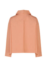 The FLAT DENIM SEASONAL jacket by me ISSEY MIYAKE is shown from the back in light salmon pink. Made of recycled polyester denim, it features a collar, buttoned cuffs, straight hem, and a subtle textured finish for minimalist style.