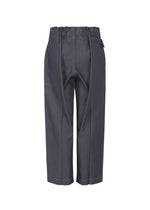 The FLAT DENIM by me ISSEY MIYAKE features dark gray, high-waisted, wide-leg straight pants with an elastic waistband and visible stitching, made from recycled polyester denim and shown from the back on a white background.