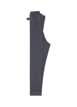 A pair of FLAT DENIM wide-leg jeans by me ISSEY MIYAKE in dark blue, folded neatly in half and displayed against a white background.