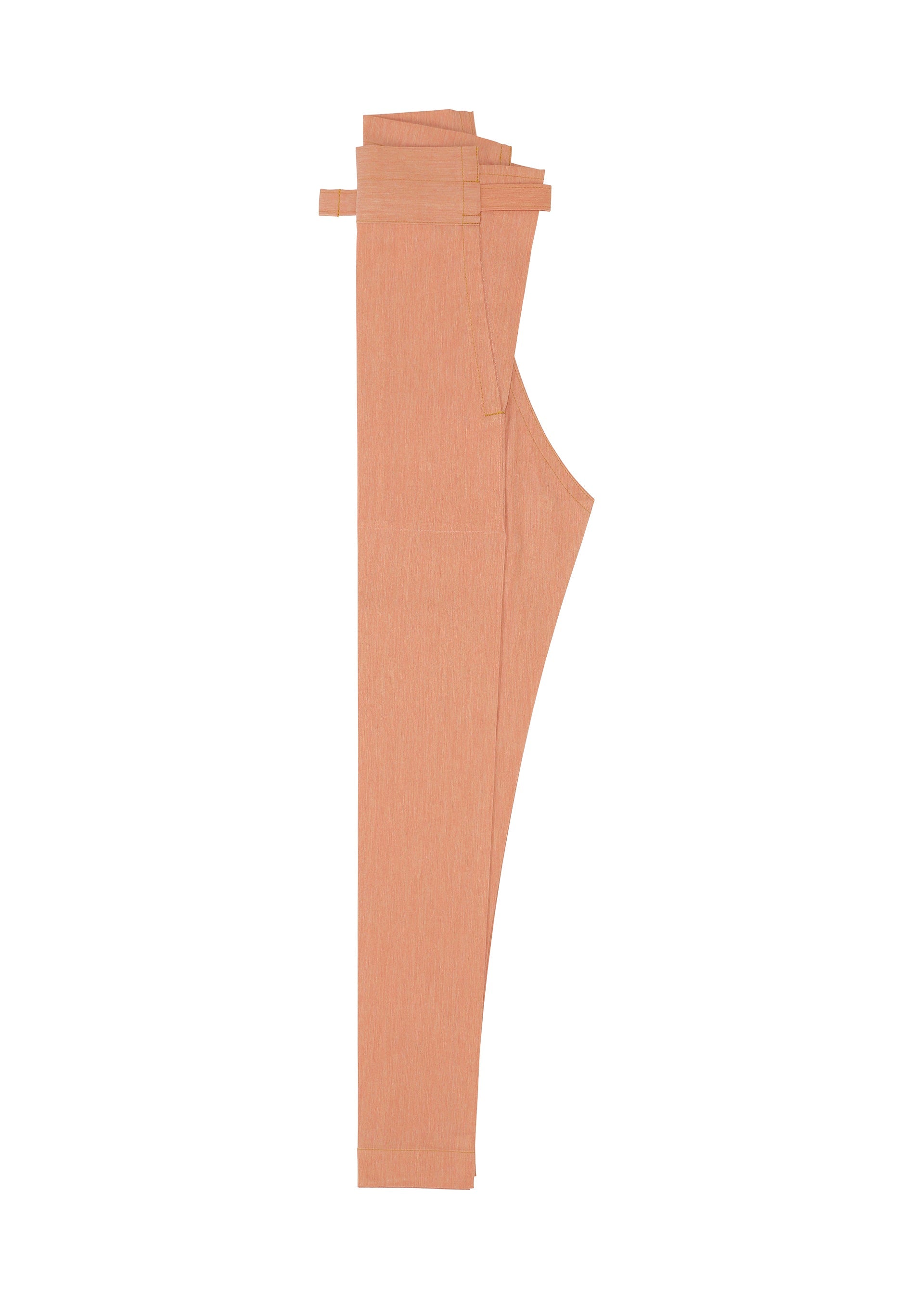 Zoomed view The FLAT DENIM SEASONAL pants by me ISSEY MIYAKE, in salmon pink, are neatly folded to show the side profile, waistband, and hem. Made with recycled polyester denim for an eco-friendly appeal.