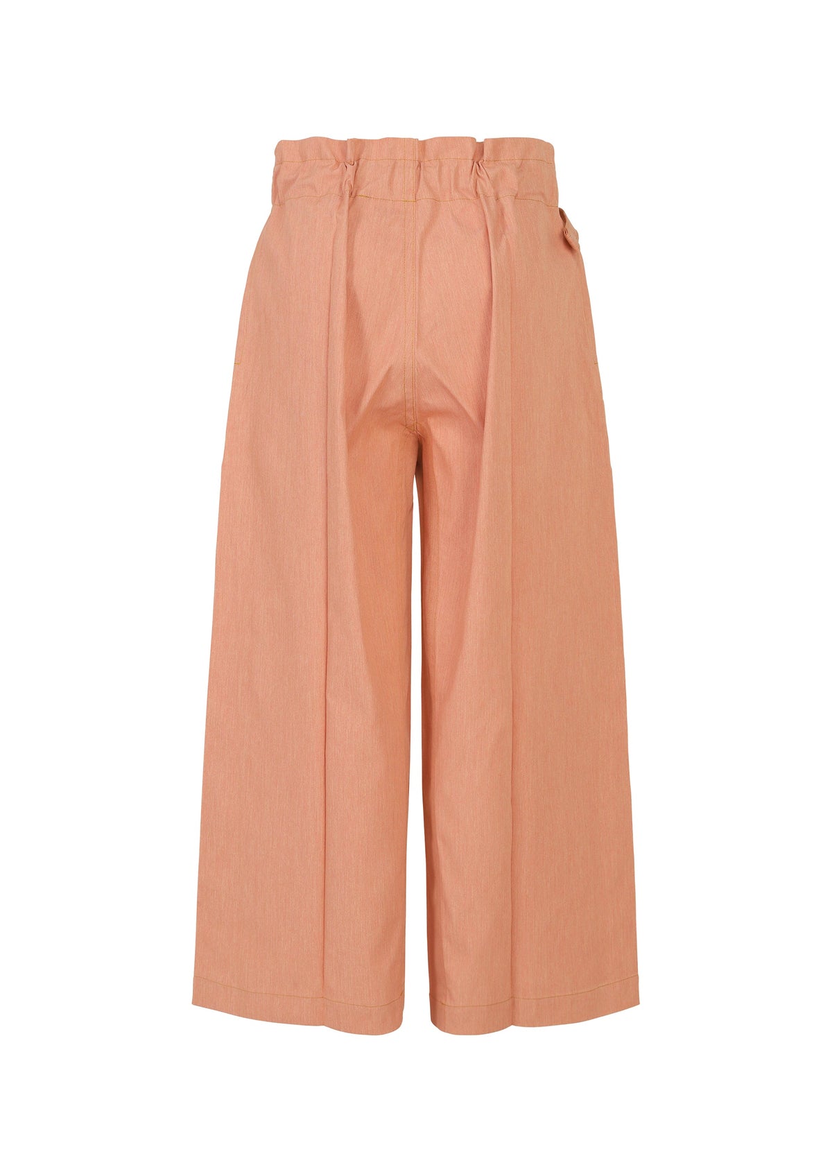 The FLAT DENIM SEASONAL by me ISSEY MIYAKE are wide-leg, high-waisted salmon pink pants in recycled polyester denim with a paperbag waistband and pleats, shown from the back against a white background. view 2 of 5