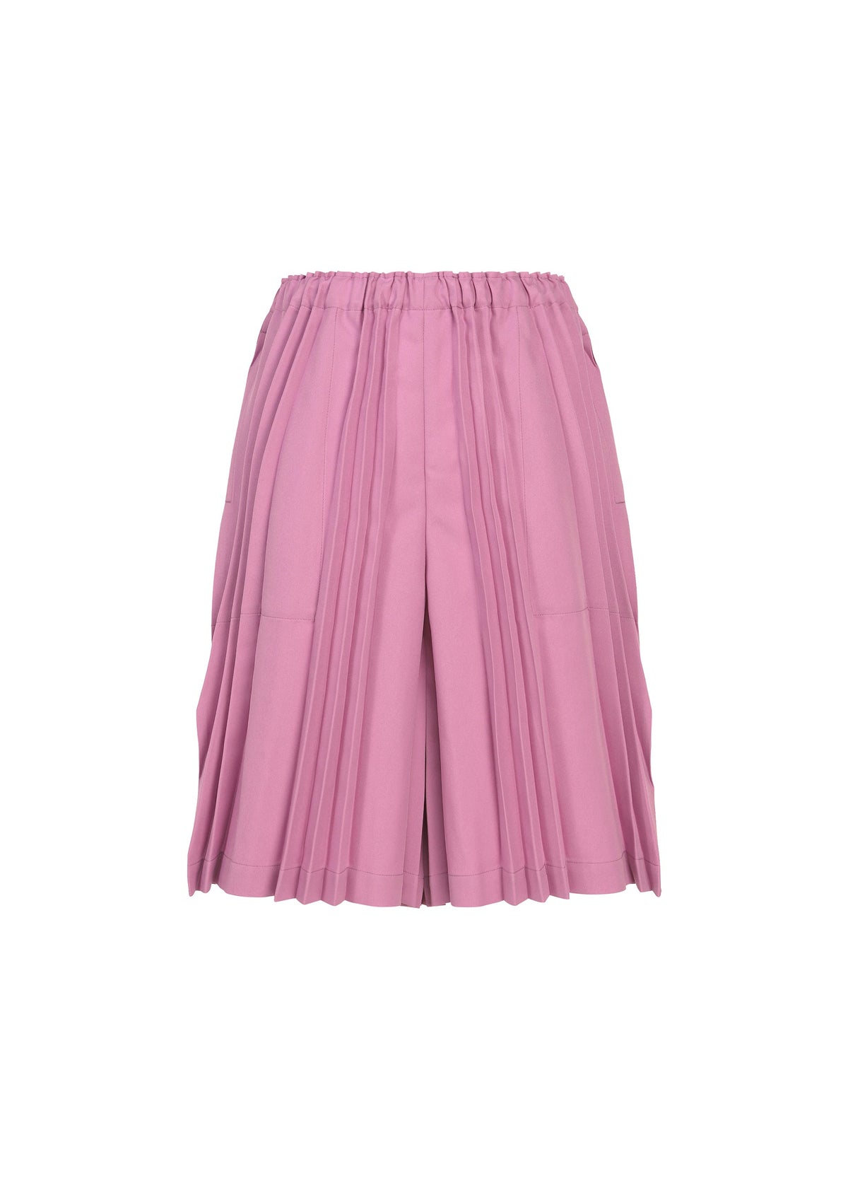 The TOWER PLEATS BOTTOM by me ISSEY MIYAKE features pink accordion pleats and an elastic waistband. Displayed against a white background, these women’s shorts are crafted from lightweight fabric for a relaxed, loose fit. view 2 of 7