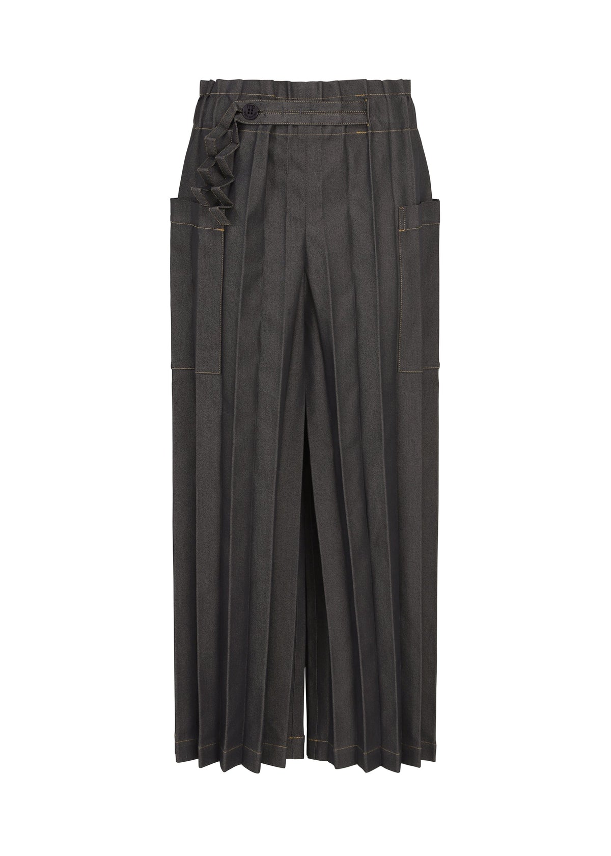 The DENIM PLEATS BOTTOM by me ISSEY MIYAKE features a wide-leg, high-waisted silhouette in dark grey with hand-pleated detailing, large side pockets, and a belted waist detail, showcased against a white background. view 1 of 6
