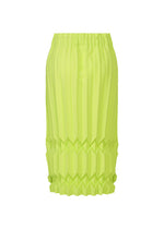 The TREE PLEATS skirt by me ISSEY MIYAKE is neon yellow-green with an elastic waistband, featuring vertical pleats on top and geometric 3D pattern folds at the bottom.