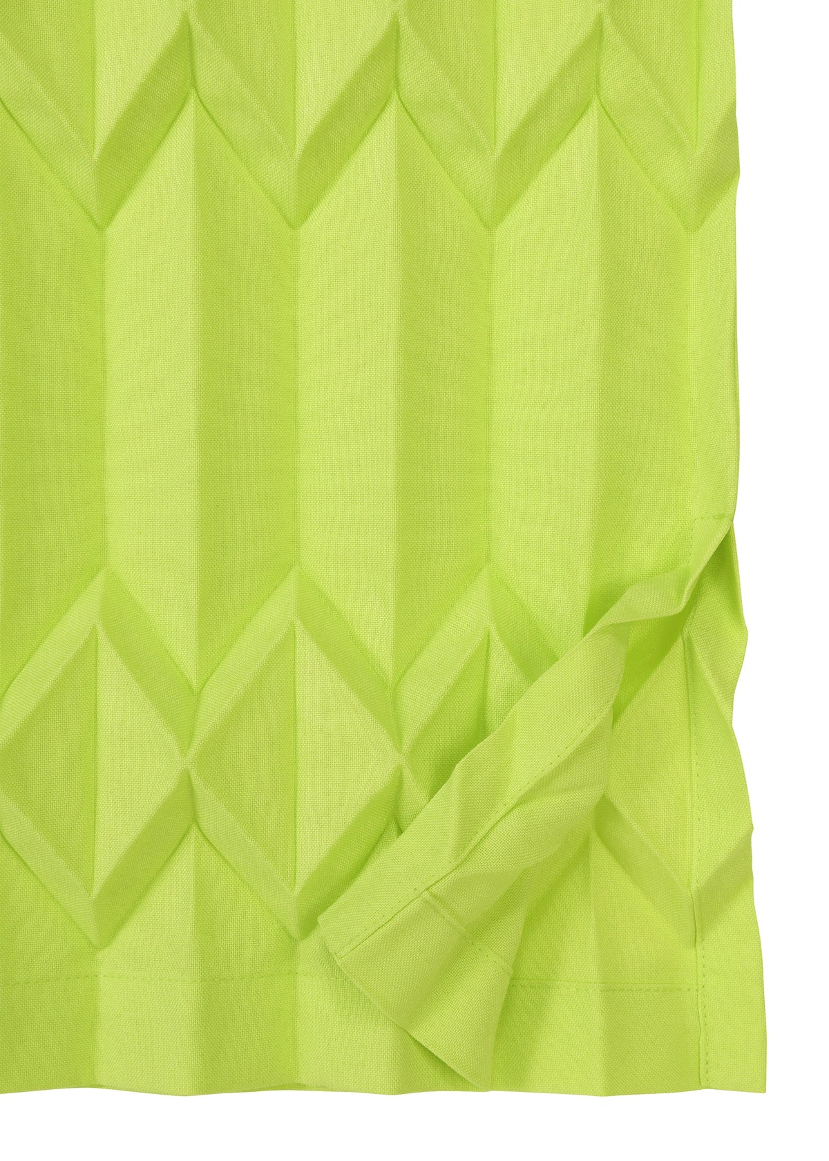TREE PLEATS by me ISSEY MIYAKE is a vibrant yellow-green, textured fabric featuring a three-dimensional diamond pattern and a folded corner revealing the material’s underside. view 5 of 8