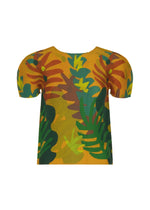 The JUNGLE top by me ISSEY MIYAKE is a short-sleeved piece featuring a vibrant yellow base with a bold multicolored leaf print in green, orange, and brown tones. It is designed with puffed sleeves and a classic crew neckline. - ORANGE-HUED （no.39）