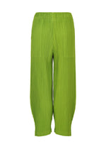 CORDUROY PLEATS by me ISSEY MIYAKE: Bright green pleated wide pants with a brushed texture, elastic waistband, and ankle-length cut, shown on a white background.