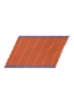 The STRIPE PLEATS STOLE by me ISSEY MIYAKE is displayed at an angle against a white background, showcasing its rectangular orange design accented with diagonal yellow stripes and blue fringed edges, reminiscent of a colorful yarn-dyed textile. - VERMILION-HUED （no.38）