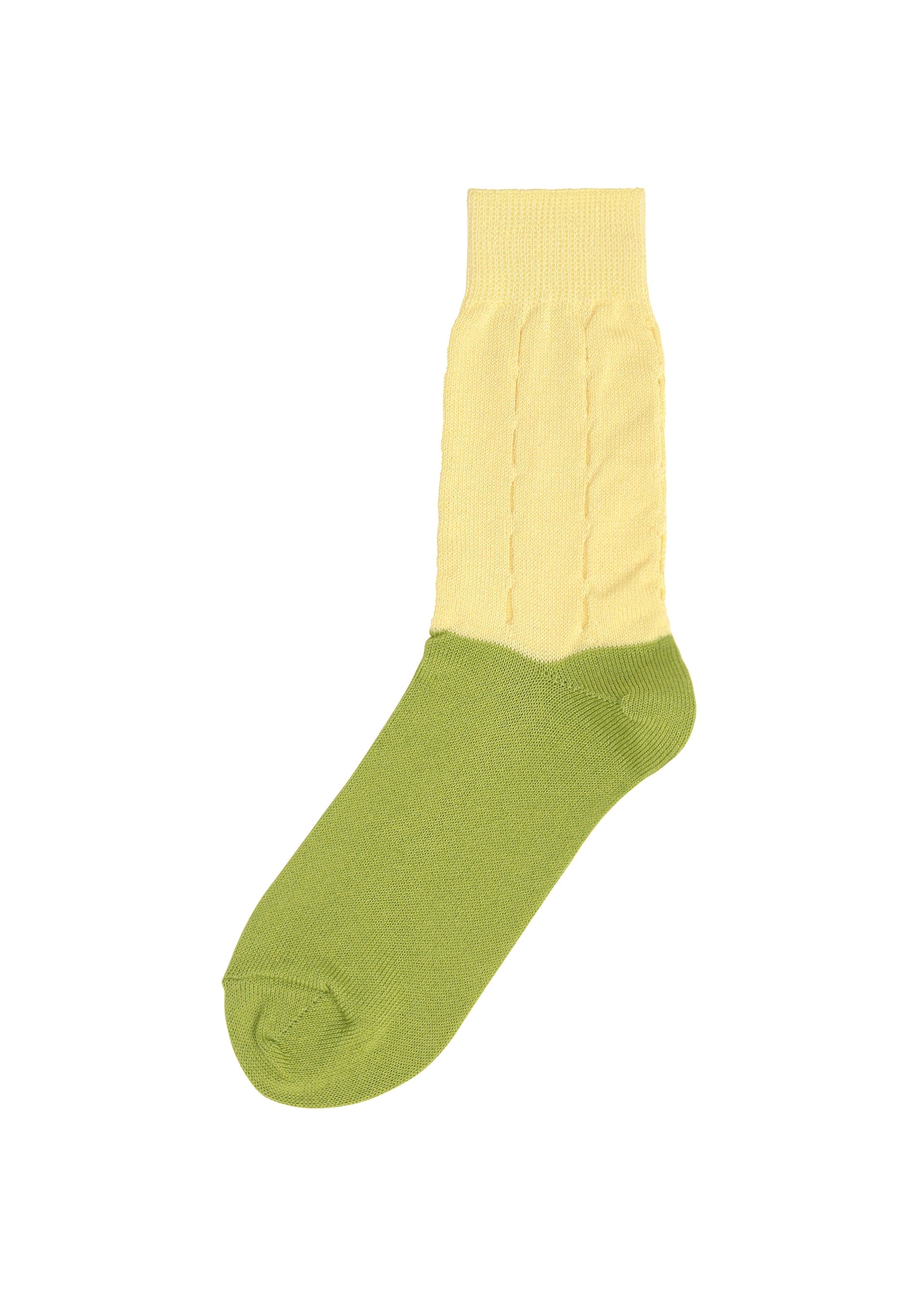 Zoomed view FRUITS SOCKS by me ISSEY MIYAKE: a unique single knit sock with an olive green foot and toe, and a pale yellow ribbed ankle and cuff. Displayed on a white background. - MELON （no.99）