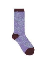 Introducing the JUNGLE SOCKS by me ISSEY MIYAKE—these vibrant purple socks are adorned with light blue squiggly lines and finished with a dark burgundy heel, toe, and top cuff. Playful and full of wild charm, they add a lively accent to any outfit.