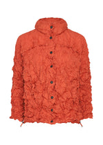 The MERINGUE PARKA by me ISSEY MIYAKE is a crinkled, bright orange packable jacket featuring black snap buttons down the front, a high collar, long sleeves, and adjustable drawstrings at the hem.