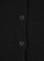 Black textured, stretchy me ISSEY MIYAKE CAULIFLOWER JACKET featuring circular buttons embossed with brand text.
