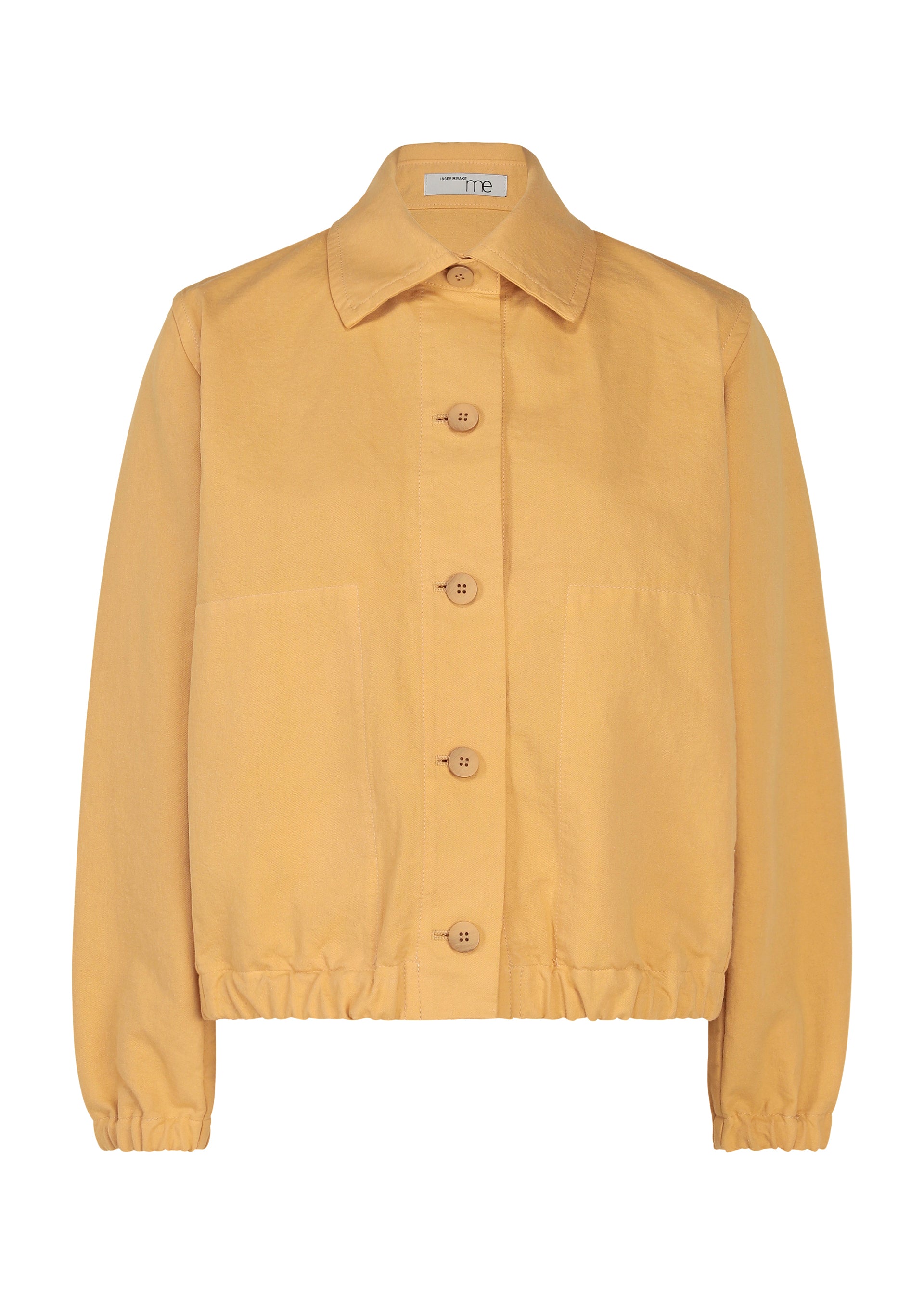 Zoomed view Sure! Here’s the rewritten sentence using your product data: The PINA CLOTH by me ISSEY MIYAKE is a mustard yellow, garment-dyed jacket featuring a collar, large front pockets, and elastic cuffs and hem. - YELLOW BEIGE （no.54）