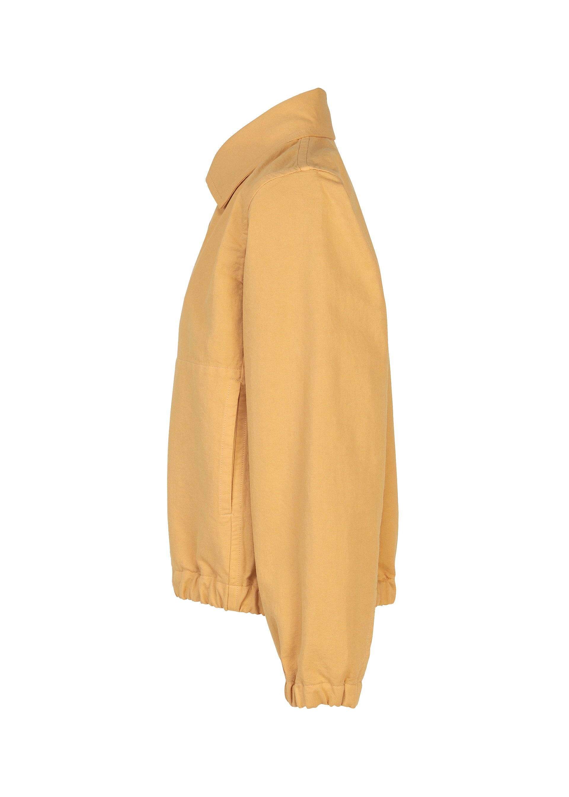 Zoomed view The PINA CLOTH jacket by me ISSEY MIYAKE is shown in a side profile view, featuring a light brown garment-dyed finish. It has a collar, elastic cuffs, and a gathered hem for a clean and simple look without any visible logos or patterns.