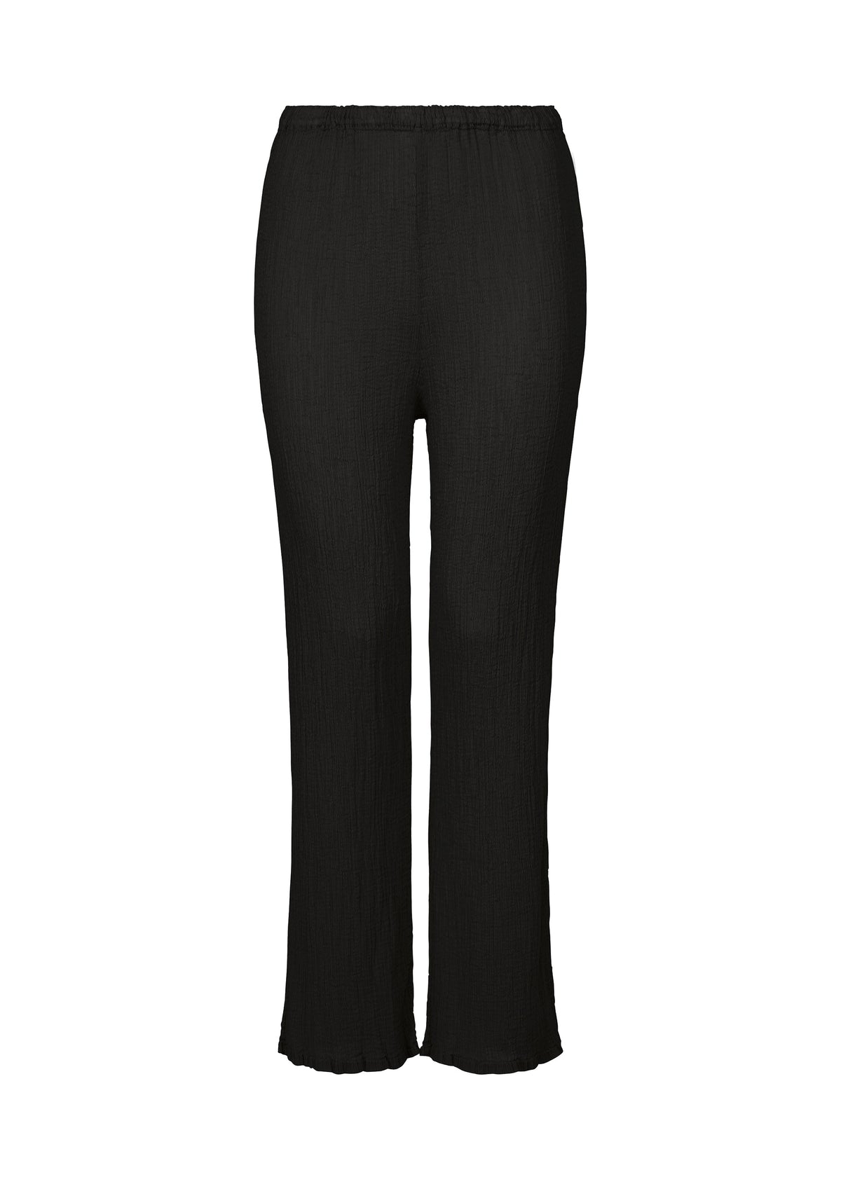 The SEE-THROUGH CREPE COLOR pants by me ISSEY MIYAKE are black, loose-fitting, full-length with a subtle drape and elastic waistband, crafted from high-twist thread for a refined texture, shown against a plain white background. view 1 of 6