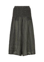 The STRIPE CAULIFLOWER culotte shorts by me ISSEY MIYAKE feature wide-leg black and gray stripes, crafted from the signature striped CAULIFLOWER fabric. These shorts offer a smocked elastic waistband and a subtly crinkled texture, ensuring cotton comfort, all showcased against a plain white background. - BLACK-HUED （no.19）