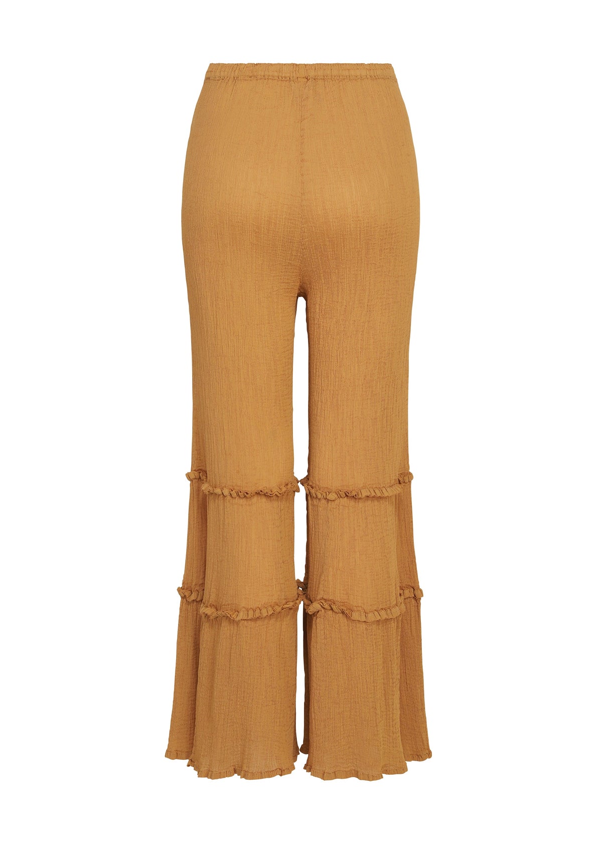 Introducing the FLARE SEE-THROUGH CREPE pants by me ISSEY MIYAKE: mustard yellow, high-waisted wide-leg trousers crafted from garment-dyed crepe fabric with a textured finish. These distinctive pants feature two horizontal ruffle accents on each leg and a subtly flared, ruffled hem that adds playful movement to the design. view 4 of 6