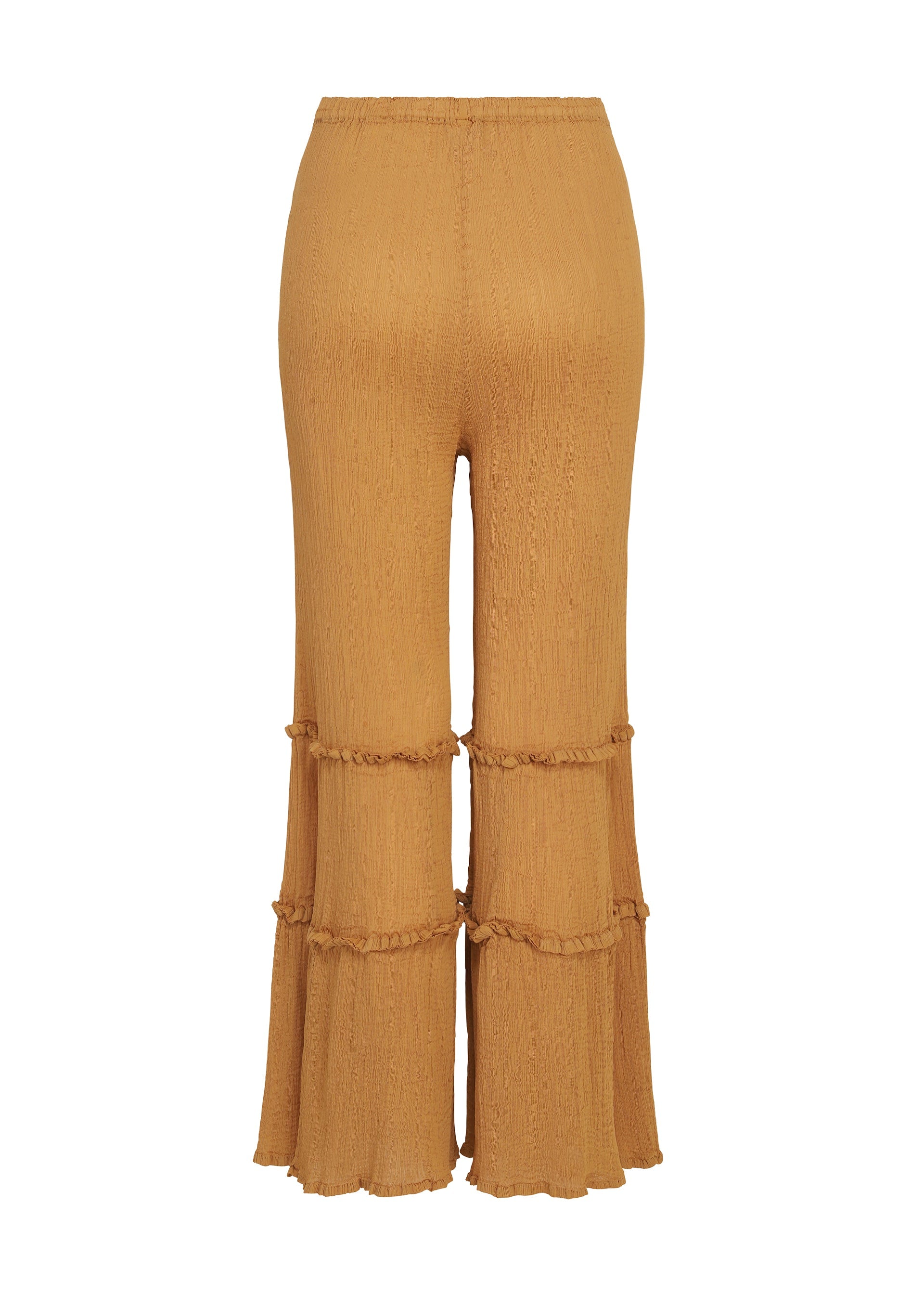 Zoomed view Introducing the FLARE SEE-THROUGH CREPE pants by me ISSEY MIYAKE: mustard yellow, high-waisted wide-leg trousers crafted from garment-dyed crepe fabric with a textured finish. These distinctive pants feature two horizontal ruffle accents on each leg and a subtly flared, ruffled hem that adds playful movement to the design.