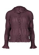 Discover the SHRINK STRIPE blouse by me ISSEY MIYAKE—a long-sleeve, dark mauve piece featuring a ruffled collar, button-down front, and a distinctive gathered, ruched texture. Inspired by the refined elegance of a cotton blend cardigan, this blouse achieves its richly nuanced color through a delicate product-dyeing technique that enhances its unique finish and depth. - BORDEAUX （no.84）