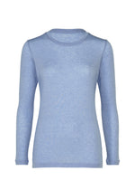 The WOOL MIX JERSEY by me ISSEY MIYAKE is a light blue, long-sleeved, round-neck shirt made from thin, slightly sheer fabric, shown against a white background. - LAVENDER （no.73）