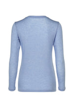 The WOOL MIX JERSEY by me ISSEY MIYAKE is a light blue, long-sleeved wool blend top with a round neck, displayed from the back on a white background.