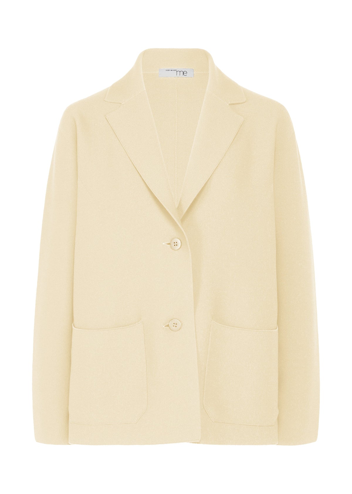 The SOLID KNIT by me ISSEY MIYAKE is a light beige, long-sleeve garment-dyed jacket with two front pockets and two buttons, made from recycled polyester—perfect for formal looks and shown on a plain white background. view 1 of 8