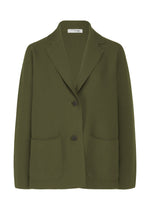 The SOLID KNIT by me ISSEY MIYAKE is an olive green, garment-dyed knit jacket with notched lapels, two front buttons, and large pockets, crafted from recycled polyester and shown on a white background. - KHAKI （no.65）