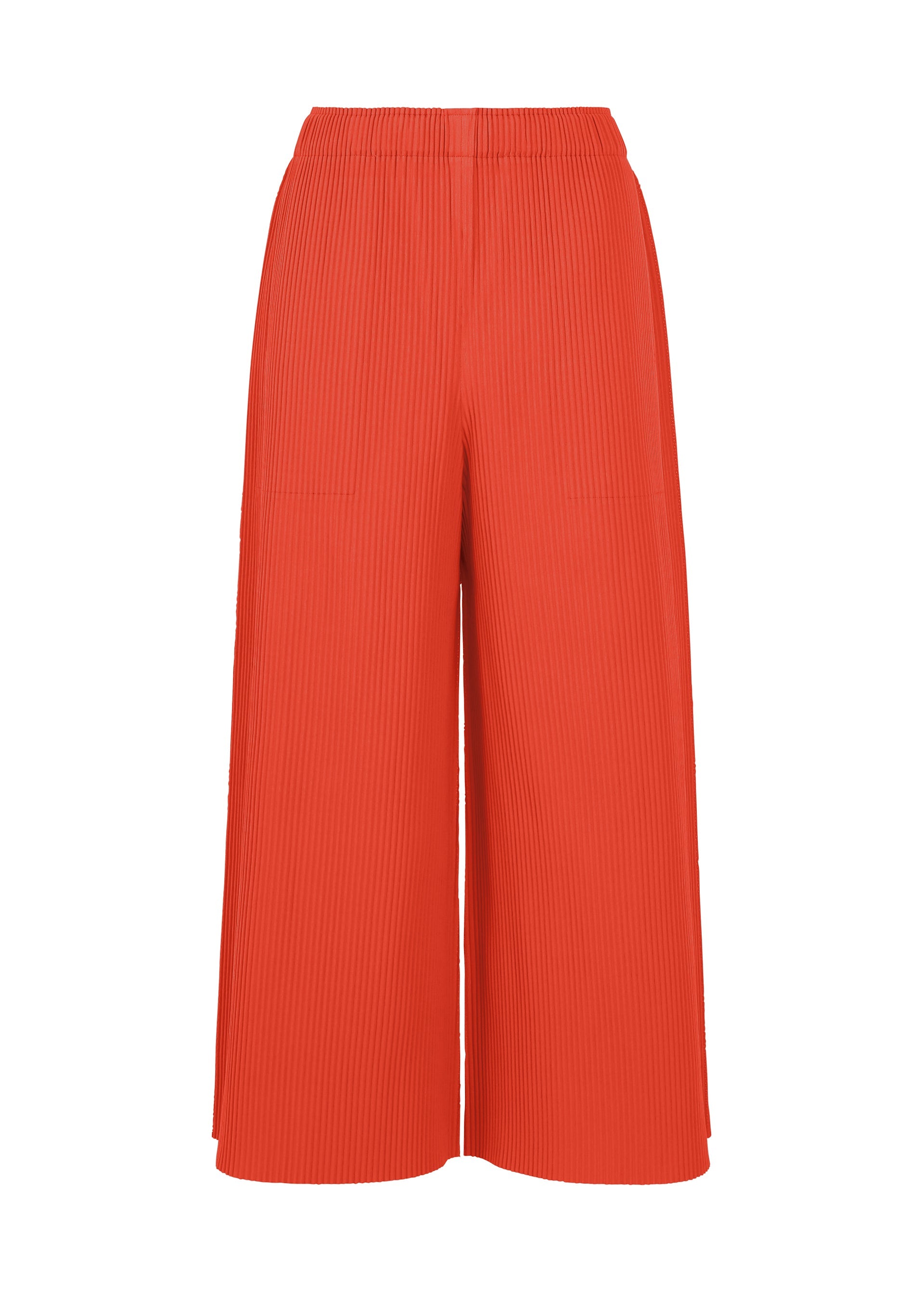 Zoomed view FINE KNIT PLEATS COLOR 2 wide-leg pleated culotte pants by me ISSEY MIYAKE, featuring a vibrant orange knit fabric and an elastic waistband, are displayed on a plain white background. - RED （no.24）