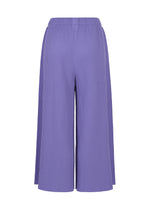 The FINE KNIT PLEATS COLOR 2 pants by me ISSEY MIYAKE are wide-leg, ankle-length trousers in light purple, crafted from a finely knit material with pleated texture. They feature an elastic waistband and offer an airy, relaxed fit.