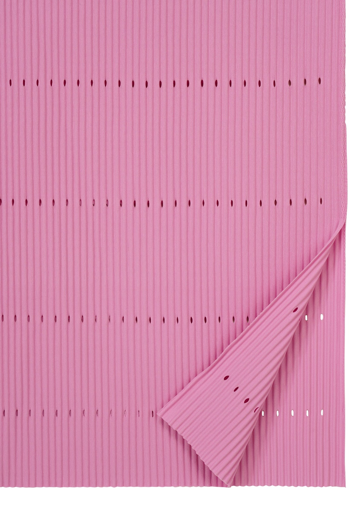 A pink, ribbed FINE KNIT PLEATS BOTTOM 1 from me ISSEY MIYAKE, featuring evenly spaced horizontal rows of small holes and a delicately folded corner that reveals the reverse side—its subtle structure and fine texture evoke the look of an elegant pleated knit skirt. view 5 of 8