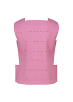 A pink, sleeveless top from me ISSEY MIYAKE’s TOWER PLEATS collection, featuring vertical ribbing, delicate perforations, and a structured, sculptural silhouette crafted from fine knit pleats.