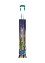 The TRUNK PLEATS BAG / NY by me ISSEY MIYAKE, featuring a colorful abstract design, stands upright with its green handle against a white background. - BLUE-HUED （no.78）