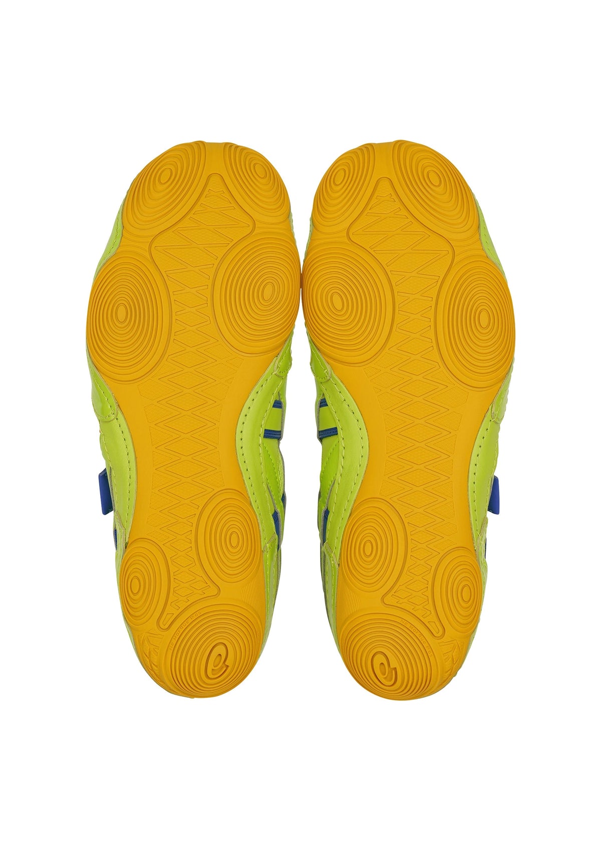 The HYPER TAPING sneakers by ISSEY MIYAKE FOOT are shown from below, displaying yellow rubber outsoles with circular and wavy patterns, plus green and blue accents on the sides—highlighting the brand’s bold design. view 6 of 6