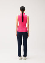 Seen from behind, a person wears a PLEATS PLEASE ISSEY MIYAKE NEW COLORFUL BASICS 5 sleeveless, pleated hot pink mock-neck top paired with pleated dark navy straight pants.