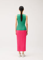 Back view of a person wearing a NEW COLORFUL BASICS 5 sleeveless green pleated top and a long pink pleated skirt with white sneakers.