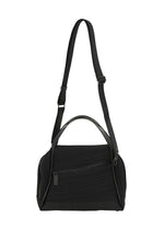 The BIAS PLEATS BAG by PLEATS PLEASE ISSEY MIYAKE is a black pleated bag with a textured surface, top handle, shoulder strap, and front zippered pocket. - BLACK (no.15)