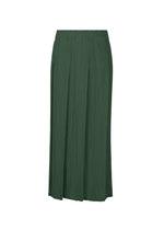 The MONTHLY COLORS : DECEMBER skirt by PLEATS PLEASE ISSEY MIYAKE is a long, dark green pleated tuck skirt with a straight waistband, shown against a plain white background. - FOREST GREEN （no.64）