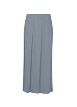 The MONTHLY COLORS : DECEMBER skirt by PLEATS PLEASE ISSEY MIYAKE features a light gray, ankle-length pleated design with an elastic waistband, shown against a white background for a joyful effect. - STEEL BLUE （no.74）