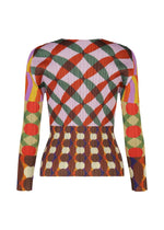 The HARMONY top by PLEATS PLEASE ISSEY MIYAKE is a fitted, long-sleeved, round-neck style with geometric red, green, yellow, and purple shapes in bold intersecting lines and circles.