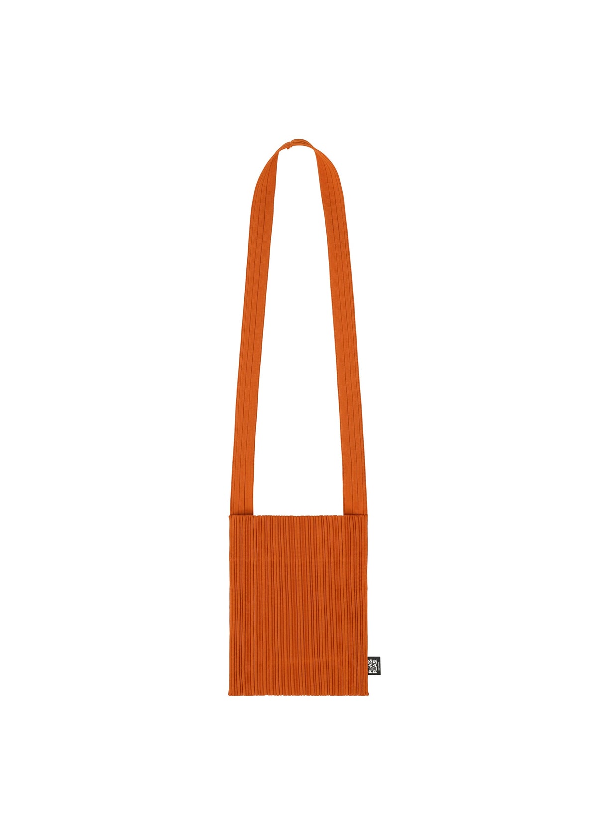 The CREPE KNIT BAG by PLEATS PLEASE ISSEY MIYAKE is an orange, pleated shoulder bag with a wide strap and a small black and white label near the bottom, displayed against a white background. view 3 of 5